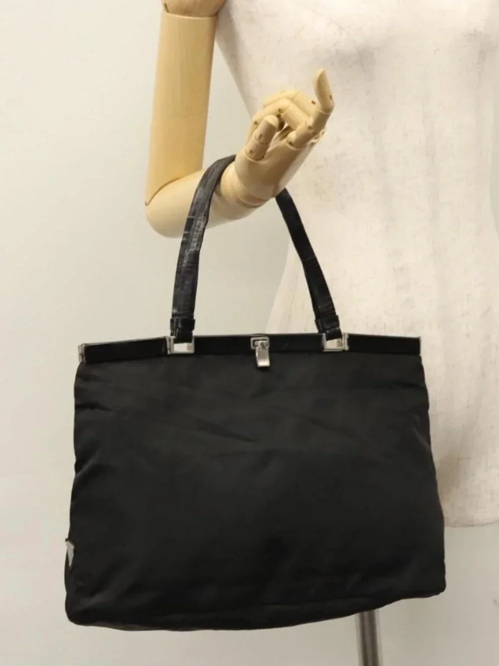 Prada brand	prada color	black